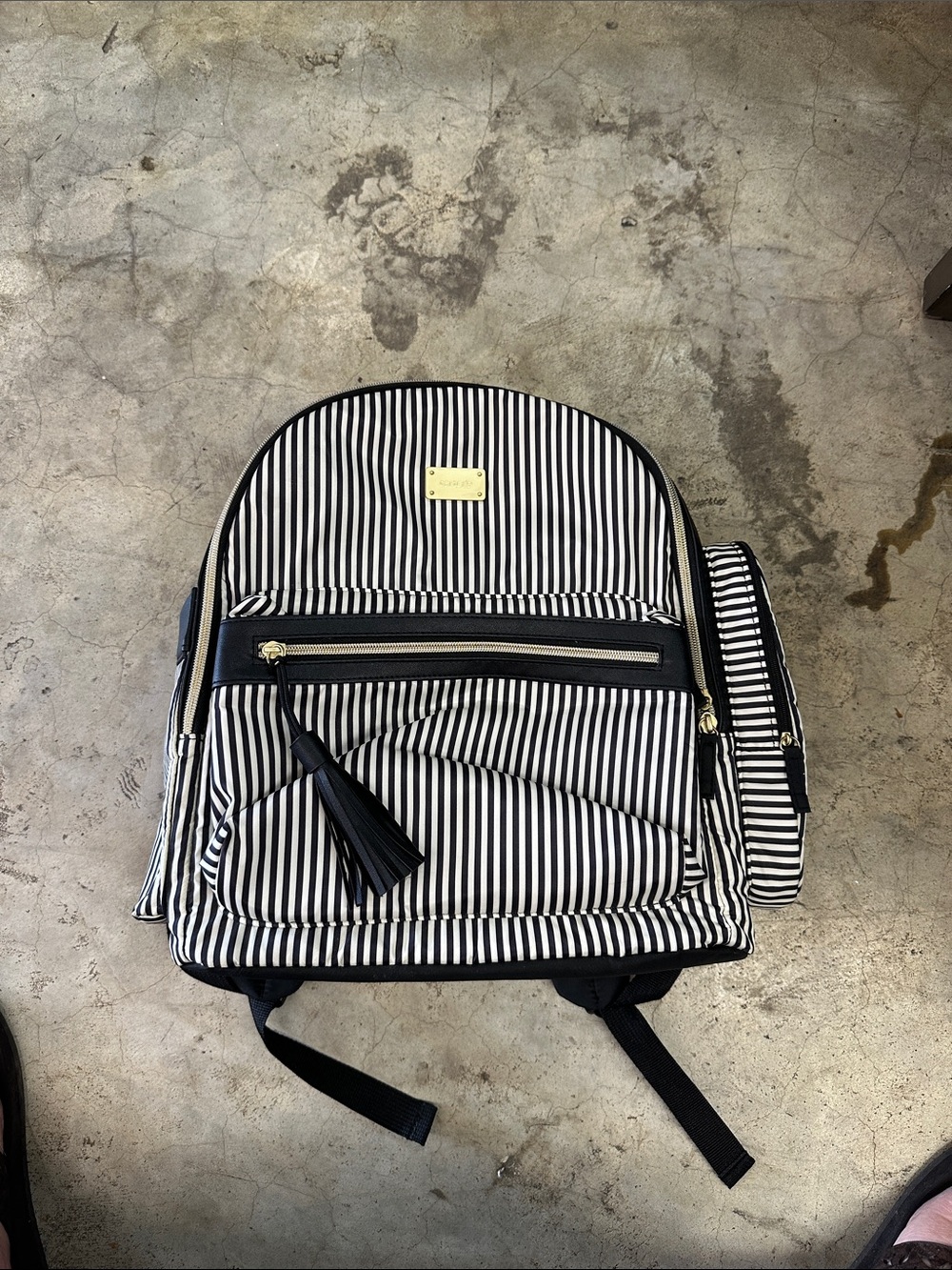 Carter Striped Black and White diaper Backpack with lots of storage room.